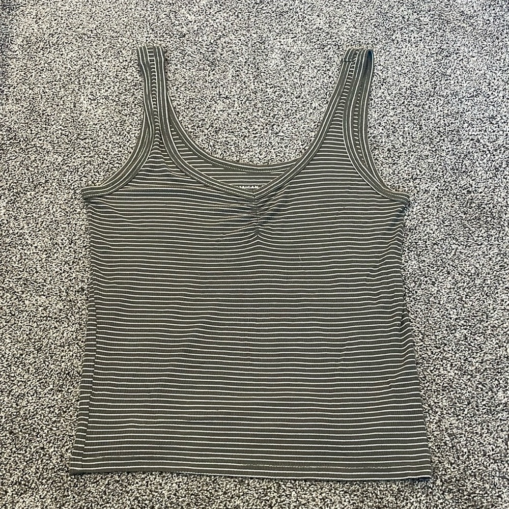 Green and white striped tank top